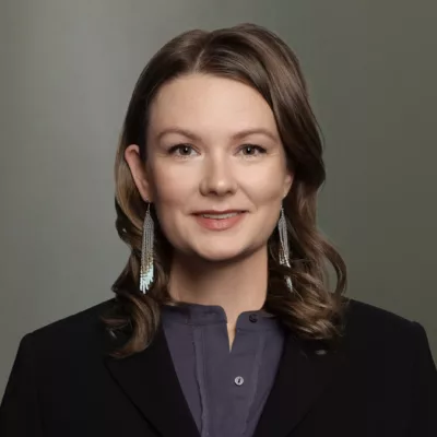 Woman headshot green background formal