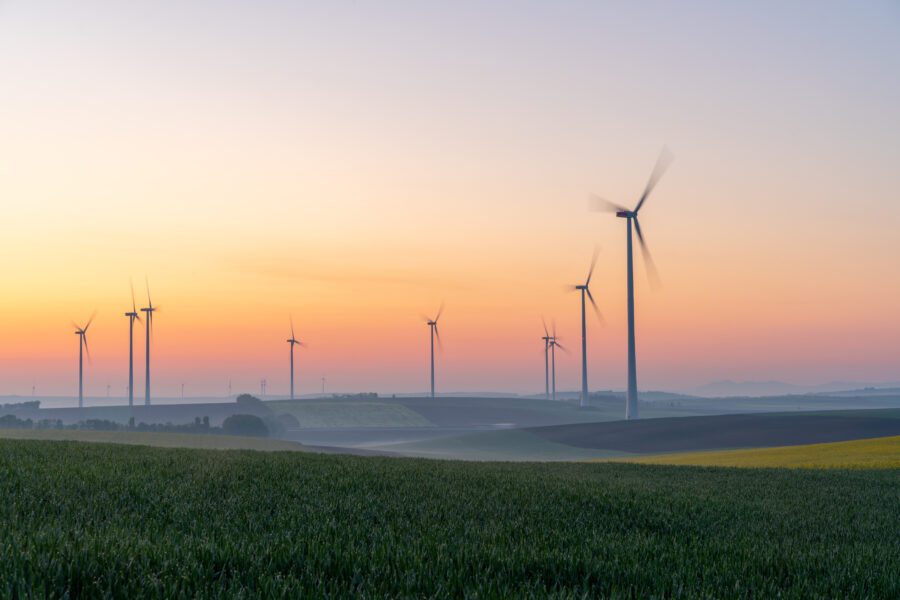 Sunset wind turbines field