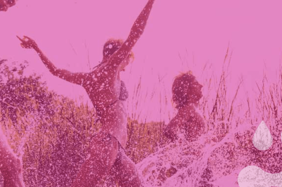 Pink overlay atop an image of people frolicking in water