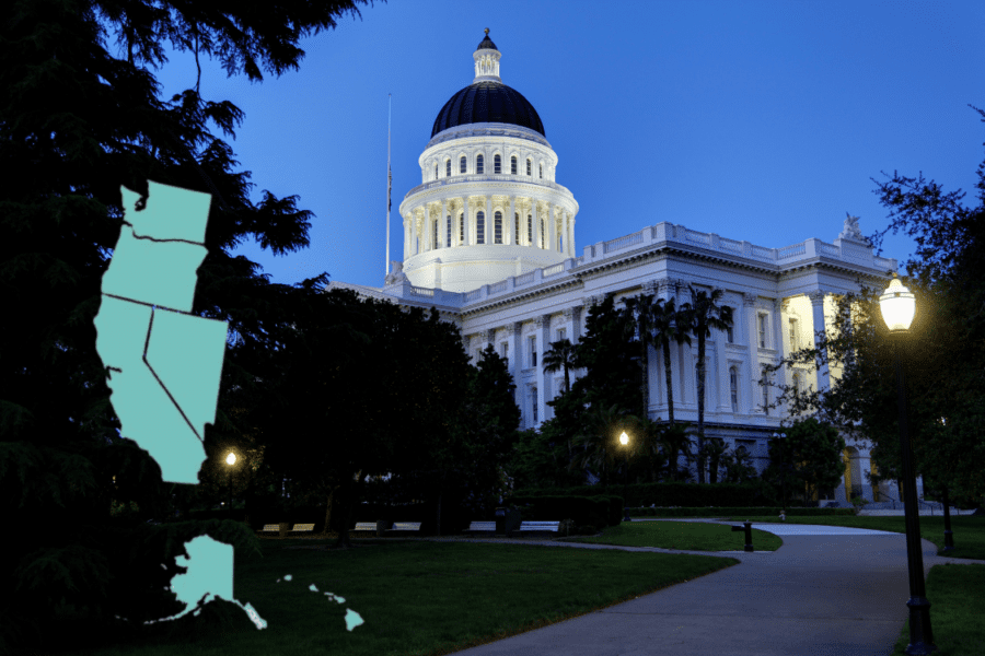 California state capitol building at night with US west coast map overlaid