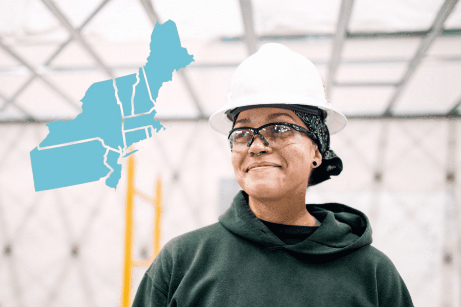 Woman with hardhat on smiling looking up with US Northeast map overlaid