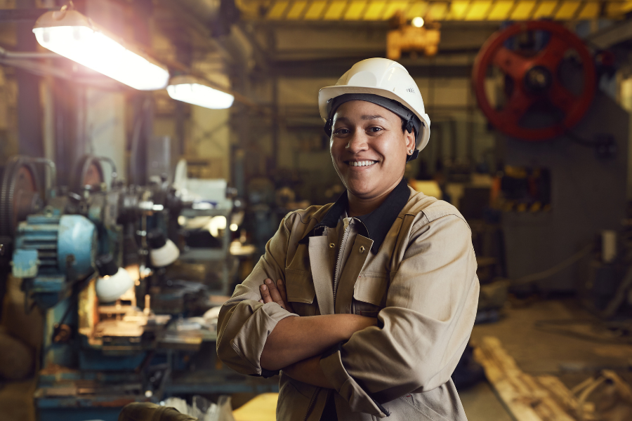 Workforce person smiling in factory setting