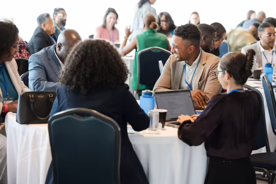 People talking at conference table
